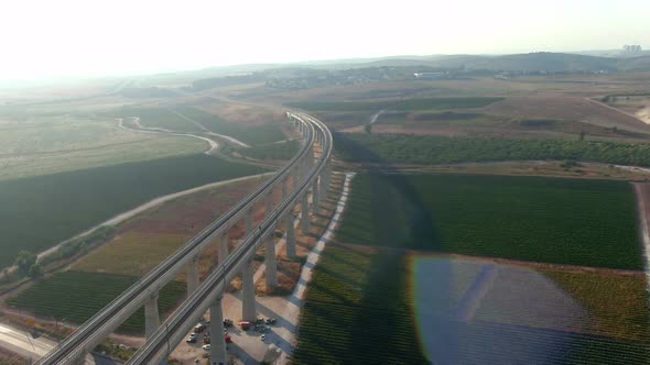Tall train bridges in the Judea valleys of Israel, aerial drone view
