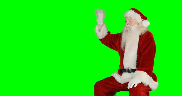 Santa claus waving hands