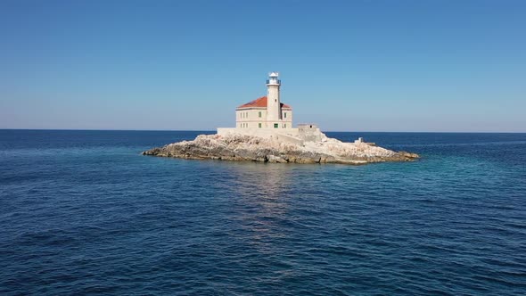 Aerial View of Mulo Lighthouse on Small Island in Croatian Adriatic Sea Water on Sunny Summer Day, D