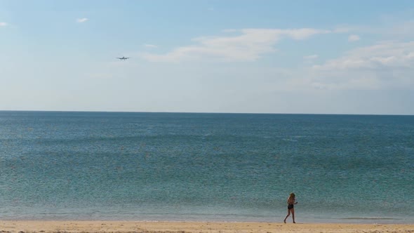 Airplane Approaching Over Ocean