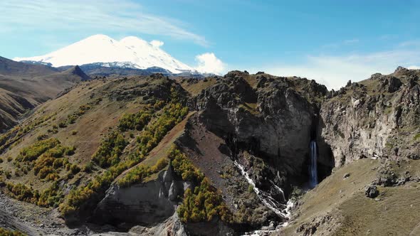 Aerial View of Mountain Waterfall and Mount Elbrus