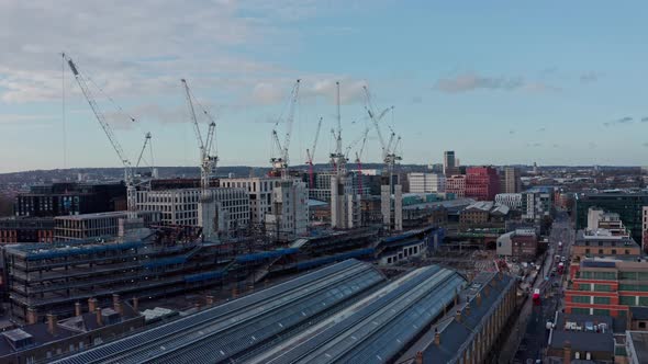 Drone shot towards construction project behind kings cross train station London