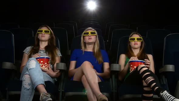 Company of Girl Watching a Movie at Cinema: Horror Film in 3D