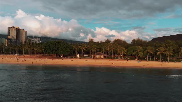 Aerial drone footage of Honolulu, Hawaii. Beautiful real estate, buildings in the city. Palm trees