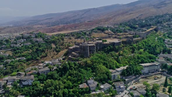 Aerial Drone View of Old Fortress and Clock Tower in Gjirokaster Albania