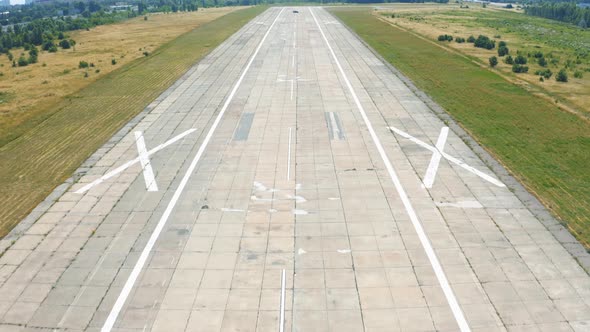 Airplane Landing on Airport Runway