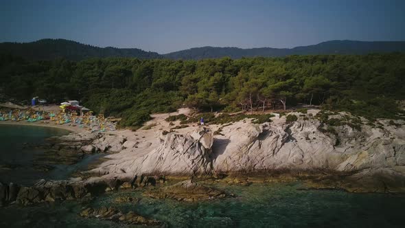 Man on Rocky Beach in Sithonia, Greece