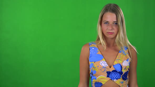 Young Pretty Blond Woman Disagrees - Green Screen - Studio