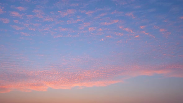 4K : Time lapse of colorful sky during beautiful sunset.  Romantic clouds.