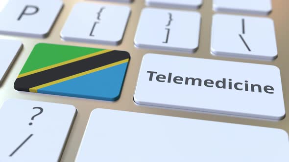 Telemedicine Text and Flag of Tanzania on the Computer Keyboard