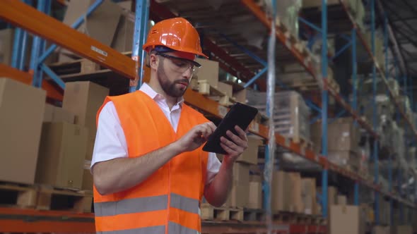 Professional Worker Working in Storehouse