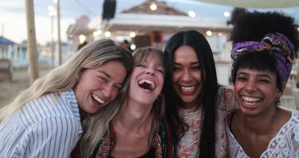 Multiracial happy friends having fun outdoor at beach party