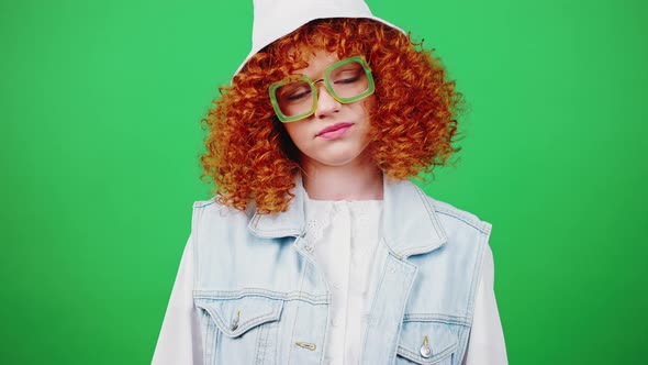 Young Boring Redhead Curly Lady Wearing Eyeglasses and Panama Hat Showing Fed Up Gesture Expressing