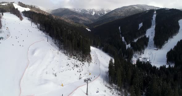 Aerial View of the Ski Resort in Mountains at Winter