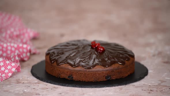 The Process of Making a Chocolate Cake with Cherries