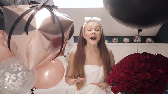 Happy Birthday Girl Clapping Hands in Bathroom with Bouquet and Air Balloon