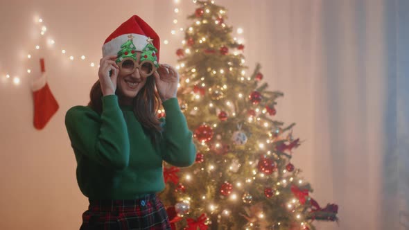 Girl dances on Christmas and New Year