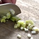 Chopping green onion by knife Close Up on Cutting Board - VideoHive Item for Sale
