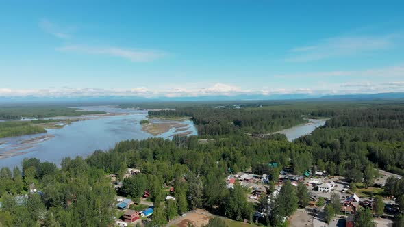 4K Drone Video of Talkeetna, AK along the Susitna River with Denali Mountain in Distance on Sunny Su