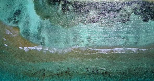 Natural drone abstract shot of a paradise sunny white sand beach and aqua blue ocean background