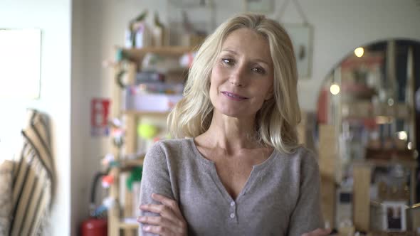 Smiling woman standing in shop