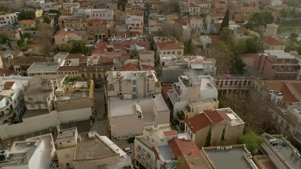 Aerial view of the parthenon temple on acropolis hill and the skyline of Athens.