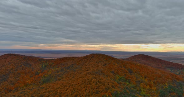 Aerial Top View Amazing Mountain Landscape with Vivid on the Colorful Autumn Forest