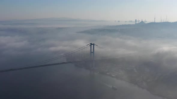 aerial video of bosphorus Bridge on a foggy day in Istanbul, Turkey, Martyrs Bridge