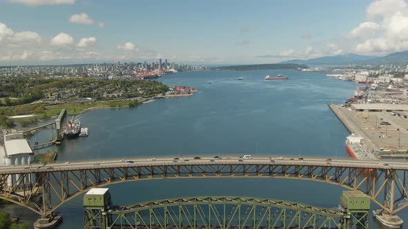 Vancouver, British Columbia, Canada. Aerial view of Industrial Sites and Second Narrows Bridge. Sunn