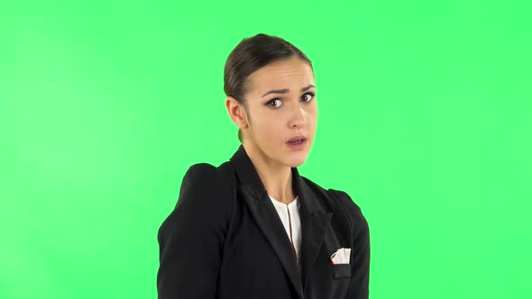 Woman Strictly Gesturing with Hands Shape Meaning Denial Saying NO. Green Screen