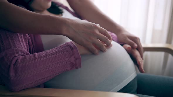 Pregnant Couple Feels Love and Relax at Home