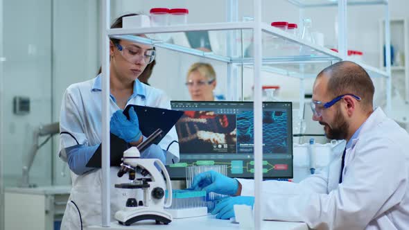 Diverse Team of Biochemistry Scientists Developing Drugs Agains New Virus alt