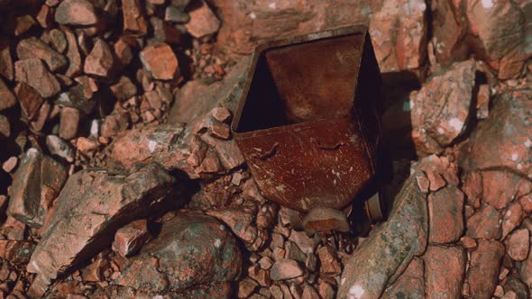 Abandoned Rusty Mine Cart on Rocks