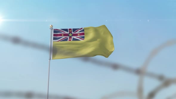 Niue Flag Behind Border alt