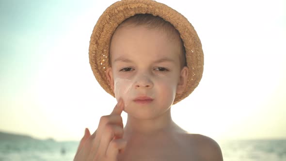 Mom Masks Her Son with Sunblock Cream