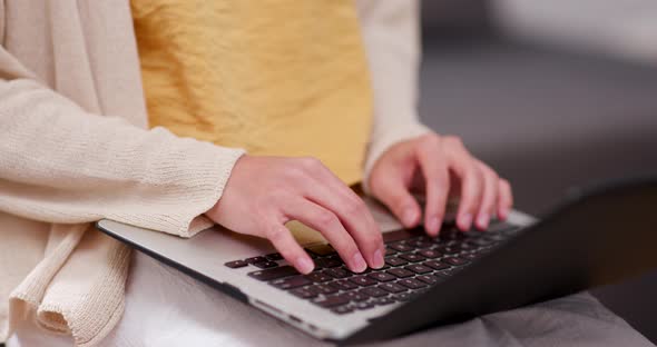 Woman working on laptop computer