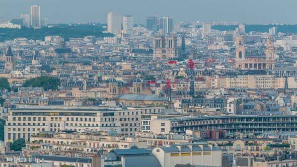 Aerial Panorama Above Houses Rooftops in a Paris Day To Night Timelapse