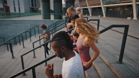 Top View of a Multiethnic Group of Friends Preparing for a Marathon