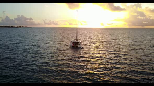 Aerial travel of relaxing bay beach lifestyle by shallow sea with white sand background of a picnic 