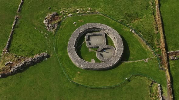 Loher Ringfort, Kerry, Ireland, March 2022. Drone orbits the ancient monument from the southeast in