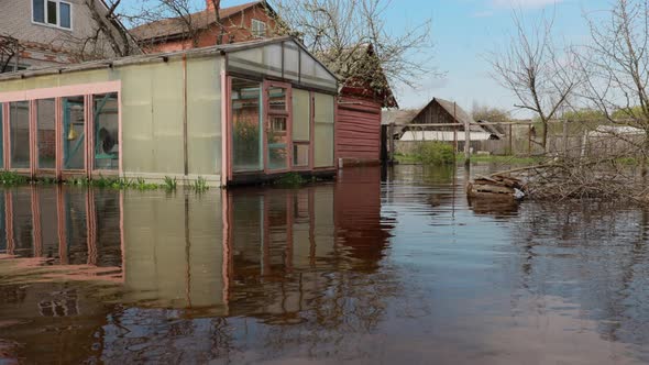 Vegetable Garden Beds In Water During Spring Flood Floodwaters During Natural Disaster