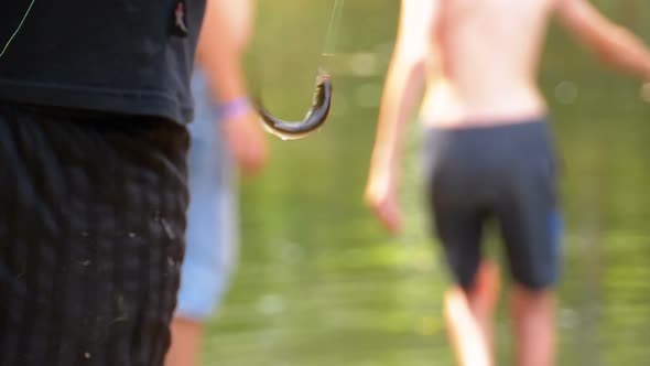 Caught Fish Dangles on a Hook Suspended on a Fishing Line. Fishing