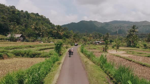Drone shot Motorbike ride Tropical road in mountains