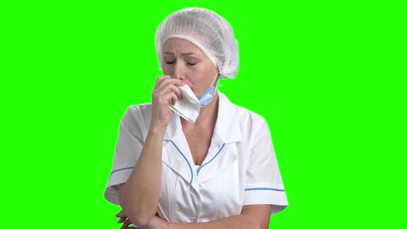 Portrait of Doctor Crying on Green Screen