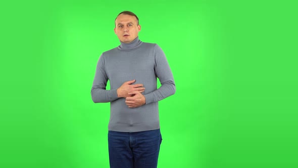 Male Looking in Surprise at Camera and Is Shocked By What He Saw, Green Screen
