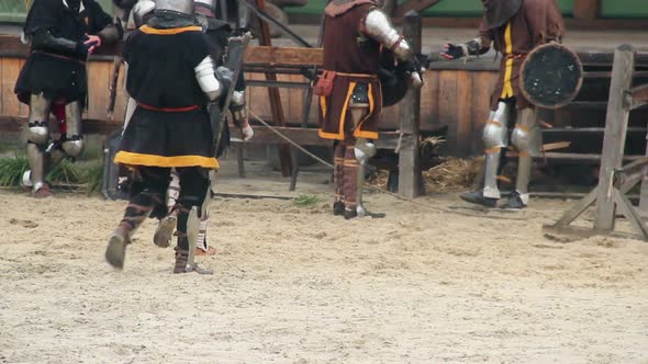Actors in Medieval Suits Having Break During Historical Movie Shoot, Reenactment