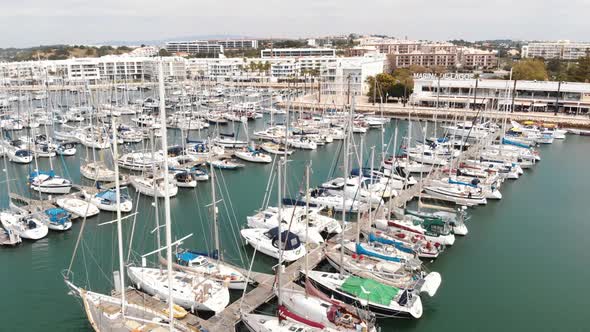 Fly over yachts at Marina de Lagos, Algarve. Luxury living concept 