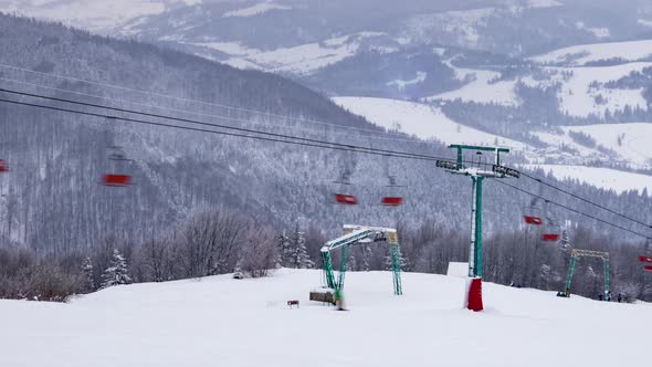 Ski Lift Skiers and Snowboarders Resort in Carpatian Mountains Time Lapse