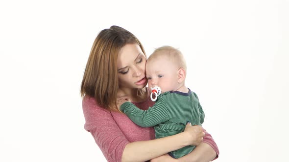 Mother and Her Newborn Baby. White