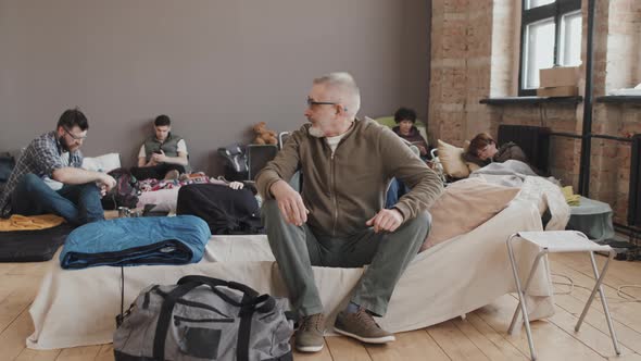 Man Unpacking in Refuge